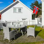 Feriehus With Two Terraces Near Risor Sondeled