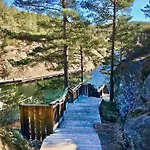 With Two Terraces Near Risor *