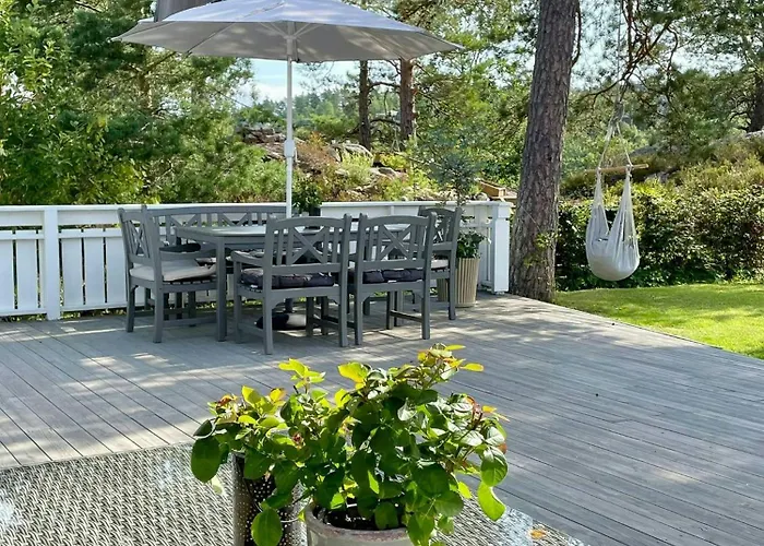 With Two Terraces Near Risor Sondeled